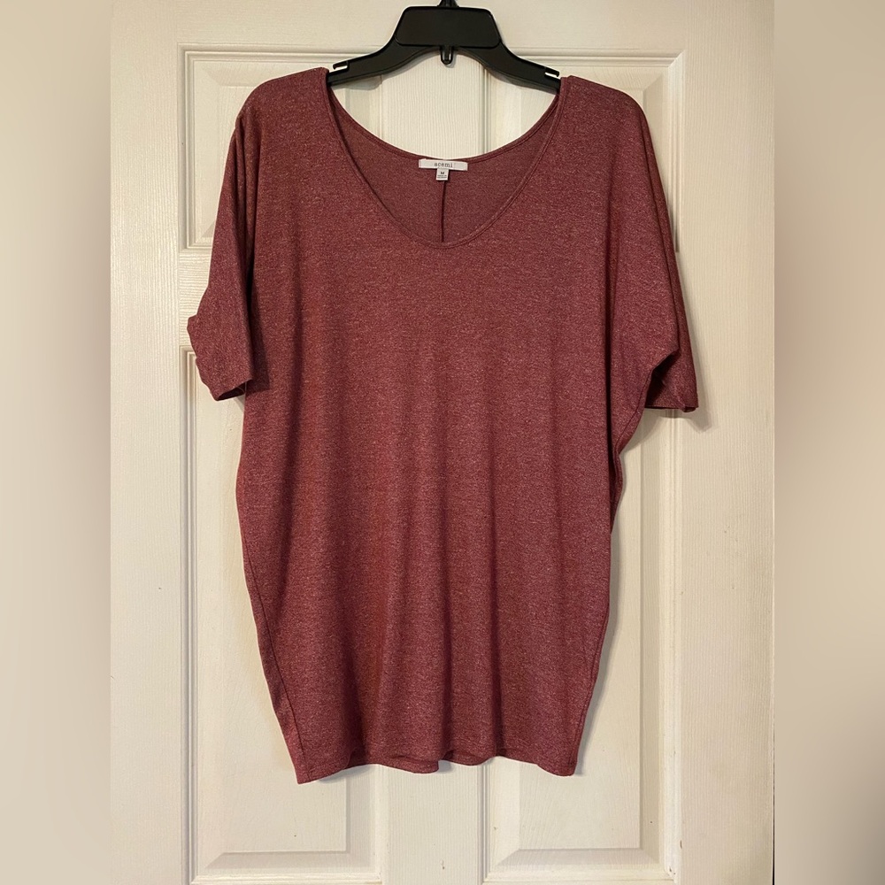 Women’s shirt size medium
Brand acemi